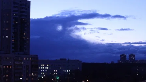 Floating clouds in the city at the end of April Video stock 88823132