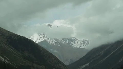 Floating clouds in the mountains-3 Stock Footage 76006624