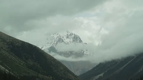 Floating clouds in the mountains-5 Stock Footage 76005276