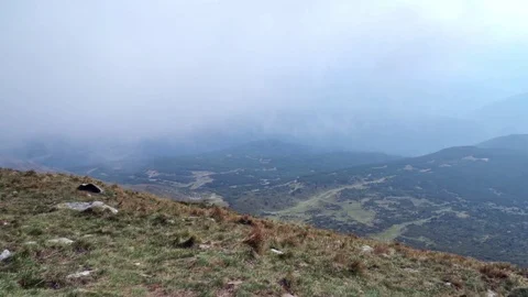 Floating clouds in the mountains Stock Footage 70821004