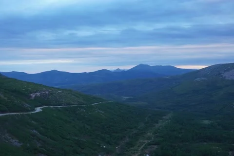 Floating clouds in the mountains at sunset Stock Footage 157795968