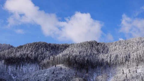 Floating clouds on a sunny winter day. Stock Footage 127229722