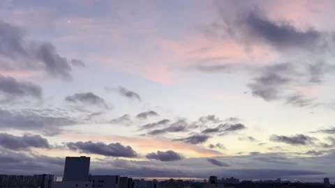 Floating clouds at sunset time Stock Footage 310470154