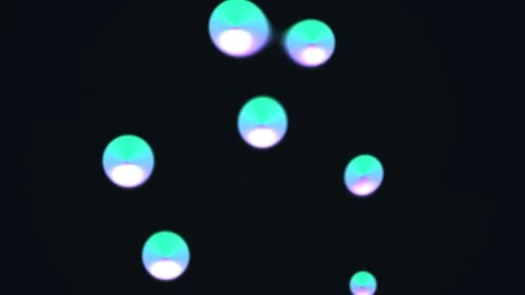 Floating colored spheres move in a dark space Stock Footage 338186156