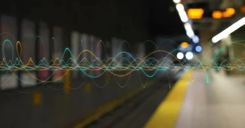 Floating colorful waveform flowing over subway platform with train tracks, Stock Photos