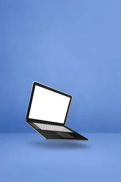 Floating computer laptop isolated on blue. Vertical background Illustrazione stock