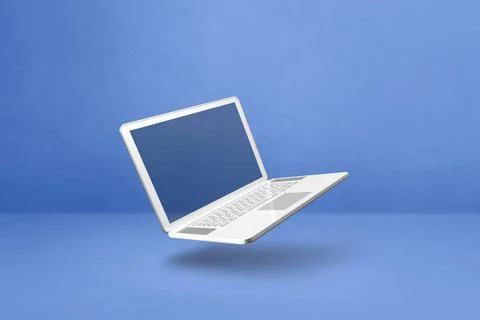 Floating computer laptop isolated on blue. Horizontal background Blank com... Stock Photos