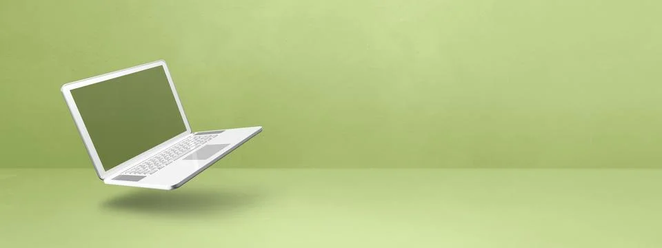 Floating computer laptop isolated on green. Horizontal banner background Illustrazione stock
