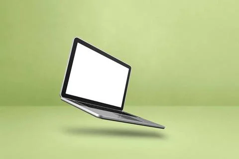 Floating computer laptop isolated on green. Horizontal background Blank co... Stock-Fotos