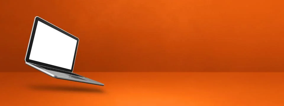 Floating computer laptop isolated on orange. Horizontal banner background Illustrazione stock