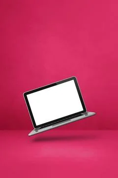 Floating computer laptop isolated on pink. Vertical background Illustrazione stock