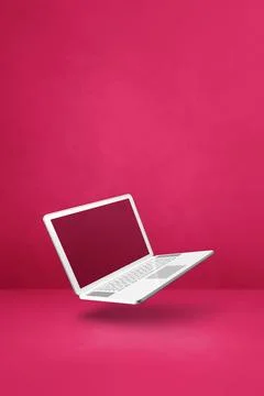Floating computer laptop isolated on pink. Vertical background イラスト素材