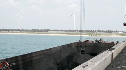 Floating crane barge coal loading Stock Footage 49684301