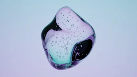 Floating Crystal Fluid Shape with Internal Air Bubble Texture on Colorful Neon Stock Footage 337303435