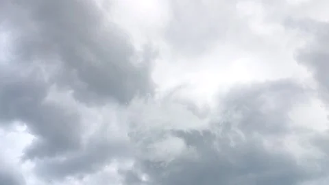 Floating dark and light storm clouds with strong wind Stock Footage 199607716