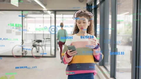 Floating data overlays causing woman in striped top sipping cup, checking phone, Stock Footage 332542971