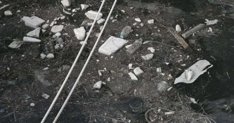 Floating debris and pollution in a body of sea. 動画素材 287922250