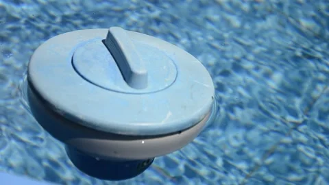Floating distributor for chlorine in swimming pool Stock Footage 134629859