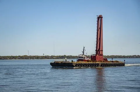 A floating dock, floating pier or floating jetty is a platform on the sea Stock Photos