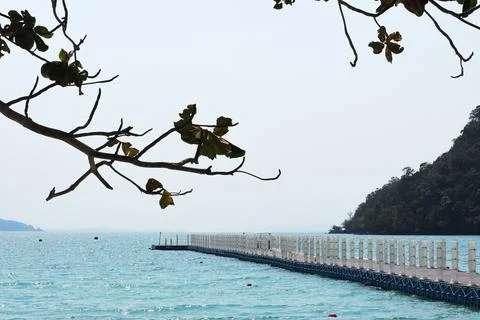 Floating dock, Plastic dock in the beautiful sea.  Stock Photos