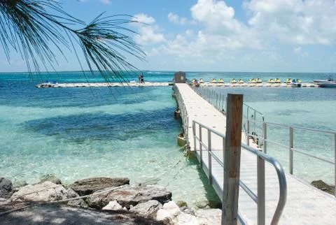 Floating Dock at a White Sand Beach in a Private Island in the Bahamas Stock Photos
