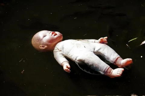 Floating Doll Stock Photos