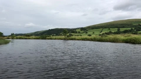 Floating down a river in Wales Stock Footage 113329521