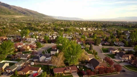 A floating drone shot over a main road in the suburbs part of Utah. Stock Footage 107322953