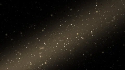 Floating dust particles in a warm sunbeam on black, 4K loop 库存影片 347110825