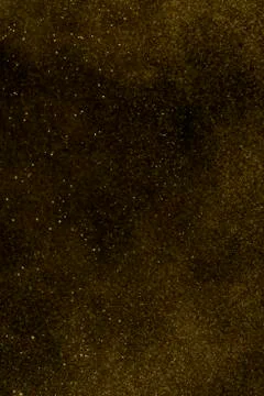 Floating elements of golden powder Stock Photos