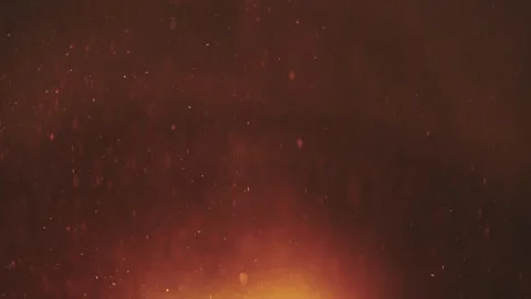 Floating ember particles drifting slowly in dark air with warm glowing ligh.. Stock Footage 337603764