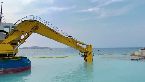 Floating Excavator Working in Sea at St Pauls Bay Malta 스톡 동영상 337345084