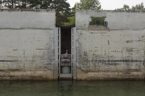 Floating eye is a movable mooring device used in locks for fixing ships. Stock Photos