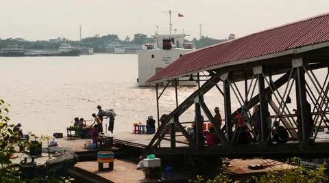 Floating Ferry with passengers and jetty - Yangon, Myanmar Stock Footage 62374784