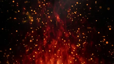 Floating fire embers and glowing sparks rising against a dark black background. Stock Footage 344918832