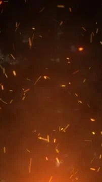 Floating fire sparks and glowing embers with smoke on dark background Illustrazione stock