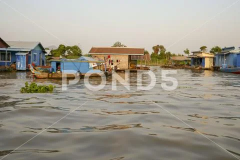Floating fishing village of Tonle Sap River in Cambodia Stock Photos