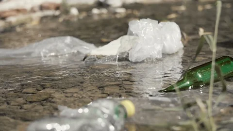 Floating garbage in the river  Video stock 112182679