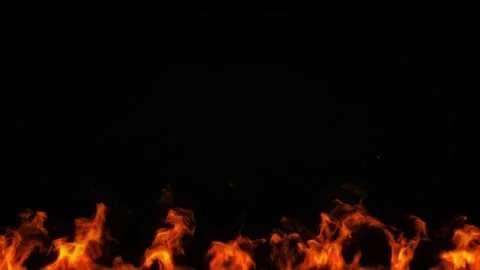 Floating glowing fire embers and subtle flame elements on black background Vídeo Stock 344992540