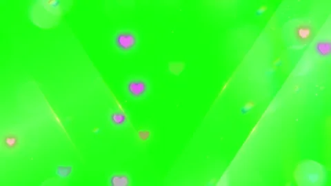 Floating glowing hearts animation over vibrant green screen background overlay Stock Footage 345101790