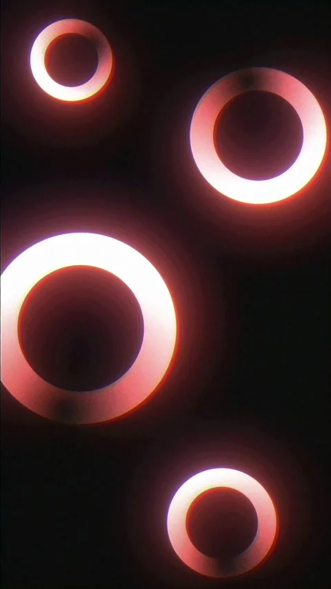 Floating Glowing Neon Rings with Soft Red Orange Gradient Stock Footage 340452983