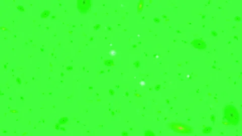 Floating glowing particles drifting across bright green chroma key background Stock Footage 345217603