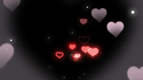 Floating glowing red hearts against dark background motion graphic romantic 動画素材 345102182