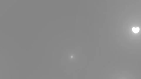 Floating glowing white hearts rising against soft grey background for romantic Stock Footage 345217170