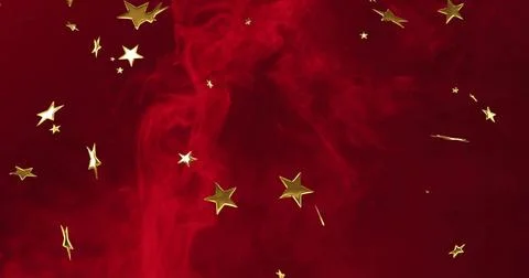 Floating gold five-pointed star confetti drifting across crimson smoke backdrop, Stock Illustration