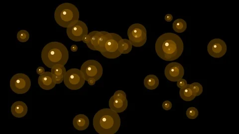 Floating gold orbs glowing on black background for luxury overlay 4K Vídeos de archivo 336483944
