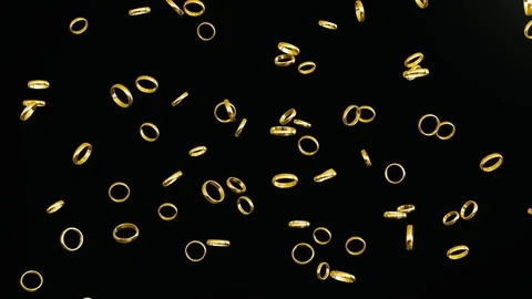 Floating Gold Rings on a Black Background 库存影片 72299696