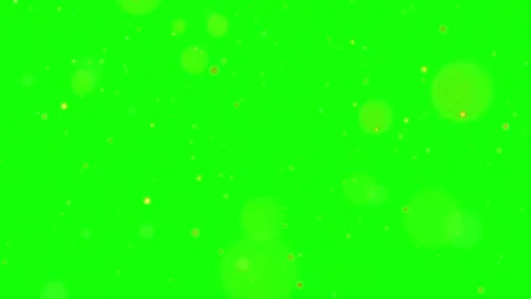 Floating golden bokeh particles drifting slowly across green screen background 動画素材 344416832