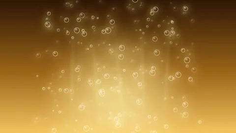 Floating golden bubbles rising against a warm amber background Stock Footage 335942801