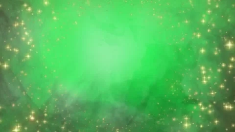 Floating Golden Confetti Particles Over A Vibrant Green Background With A Stock Footage 338368573